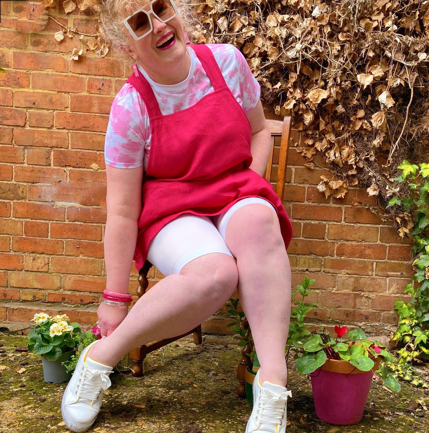 Woman wearing white chub rub shorts